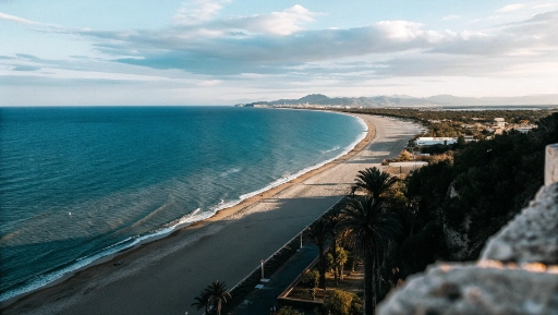 Panoramic view of Terracina coastline with golden sandy beach and Mediterranean Sea